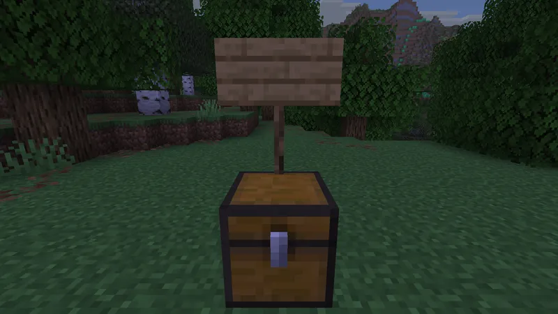 A chest and a sign: [GOD] on the first line, Zeus on the second, and the sign turns gold