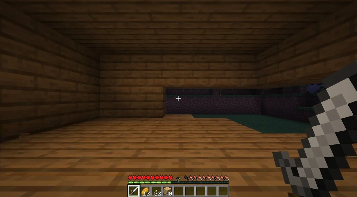 Zombies breaking through a wall